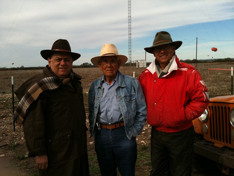 Rudi, his father Ted, and his brother Albert in front of the ranch truck on the ranch